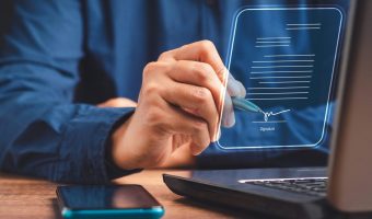 Electronic,Signature,And,Paperless,Office,Concept.,A,Businessman,Uses,A