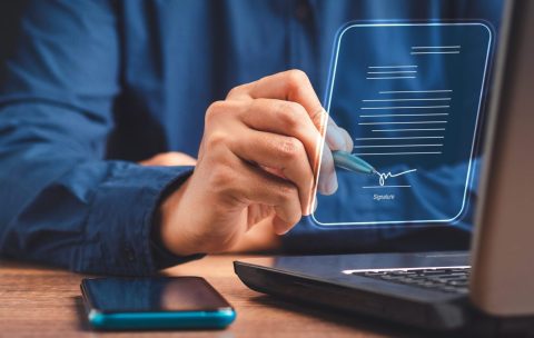 Electronic,Signature,And,Paperless,Office,Concept.,A,Businessman,Uses,A
